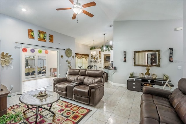 living room with high vaulted ceiling, light tile patterned floors, and ceiling fan