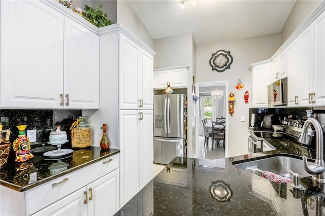 kitchen with white cabinetry and stainless steel appliances