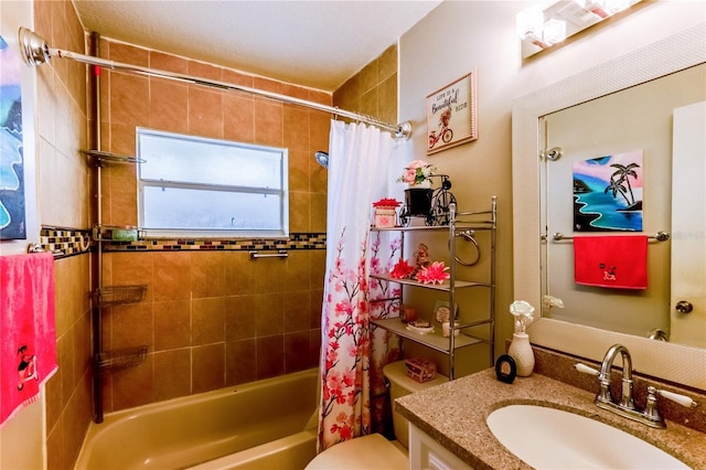 full bathroom featuring vanity, toilet, and shower / bath combo with shower curtain