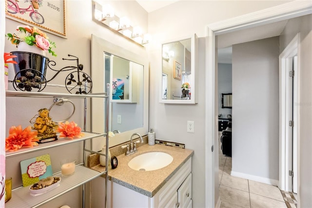 bathroom featuring vanity and tile patterned flooring