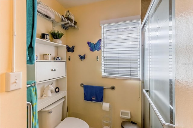 bathroom featuring toilet