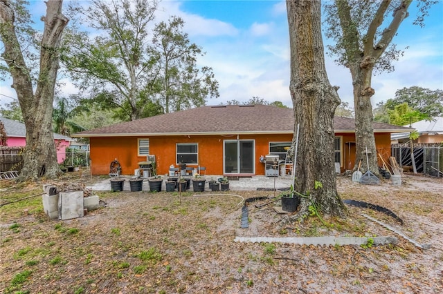 rear view of house featuring a patio area