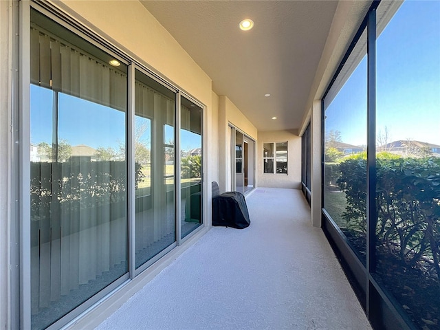 unfurnished sunroom with plenty of natural light