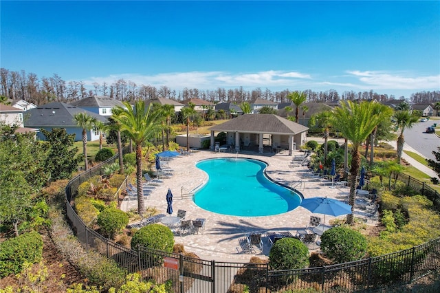 view of swimming pool featuring a patio area