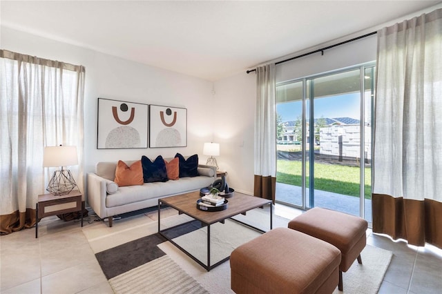 living room with tile patterned floors