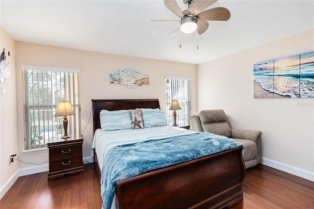 bedroom featuring dark wood-type flooring and ceiling fan