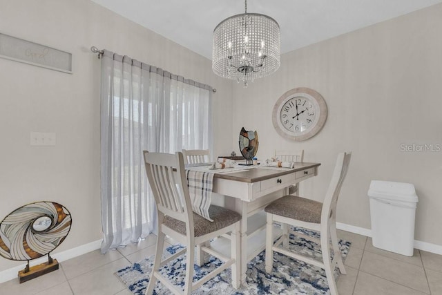 tiled dining area with a chandelier