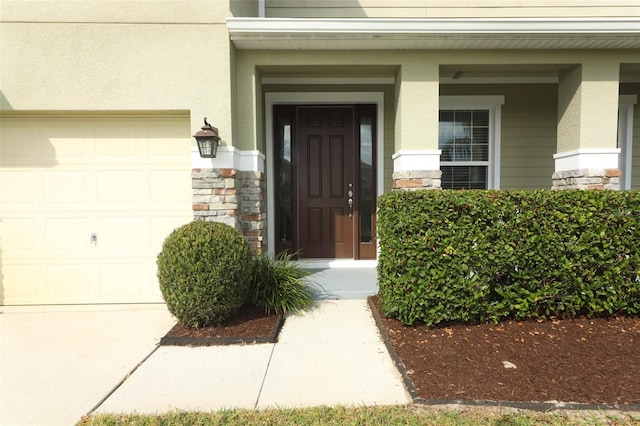 entrance to property featuring a garage