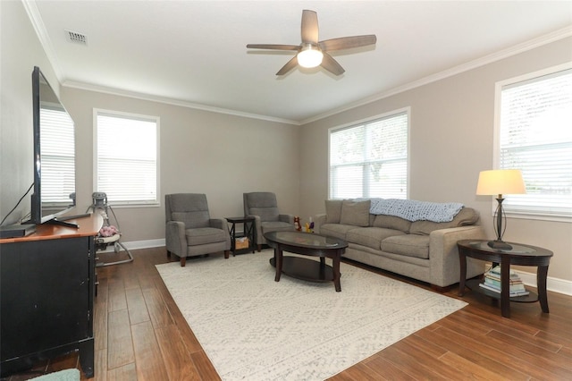 living room featuring ornamental molding, dark hardwood / wood-style floors, and ceiling fan