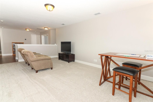 office area with light colored carpet