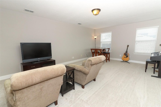 living room featuring light carpet