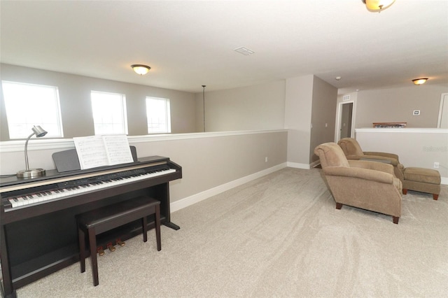 sitting room with light carpet