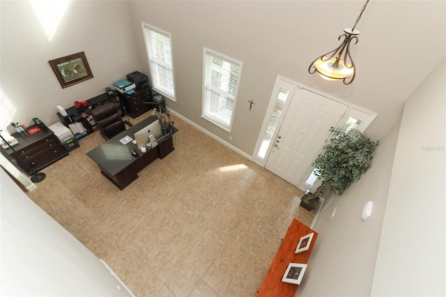 living room with a high ceiling