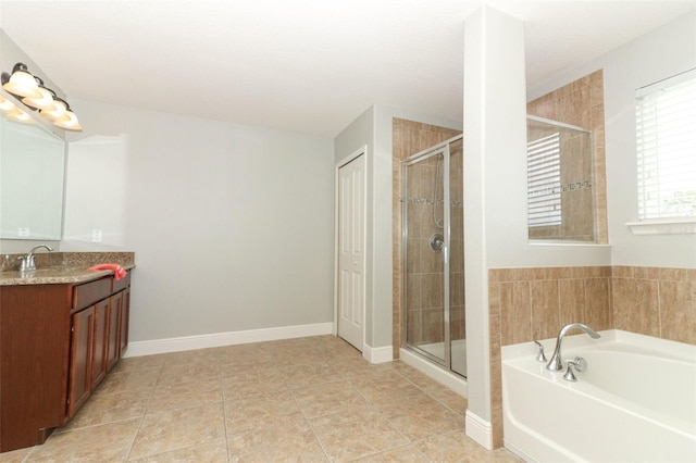 bathroom featuring vanity, tile patterned floors, and independent shower and bath