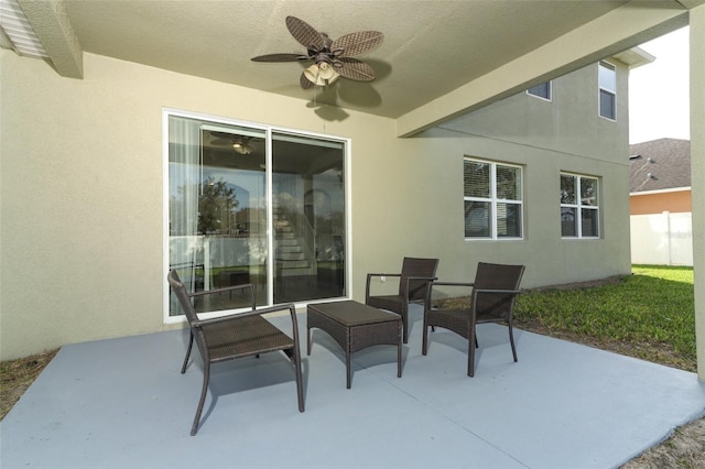 view of patio / terrace featuring ceiling fan