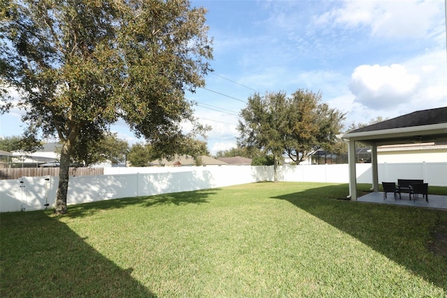 view of yard with a patio area