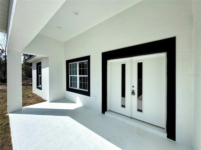 view of patio featuring french doors