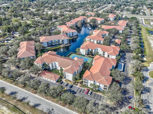 drone / aerial view with a water view