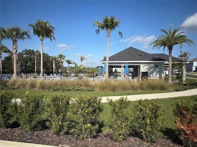 surrounding community featuring fence