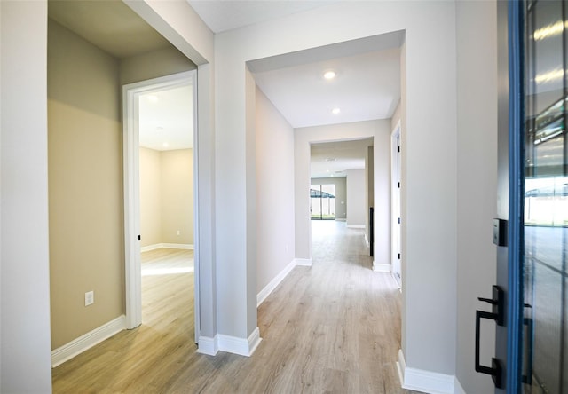 4425 Lions Gate Ave, Clermont, FL 34711 - hallway with wood finished floors and baseboards