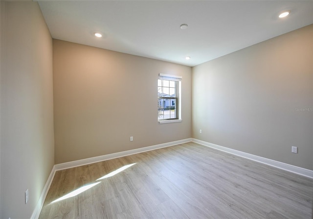 4425 Lions Gate Ave, Clermont, FL 34711 - empty room featuring wood finished floors, baseboards, and recessed lighting