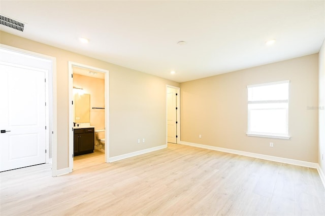 4425 Lions Gate Ave, Clermont, FL 34711 - empty room with light wood-style floors, baseboards, and recessed lighting