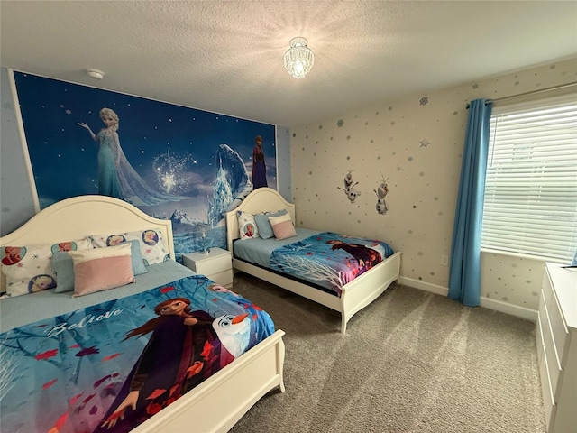 carpeted bedroom featuring a textured ceiling