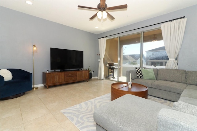 tiled living room featuring ceiling fan