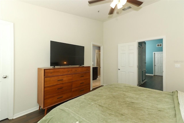 bedroom featuring dark hardwood / wood-style floors and ceiling fan