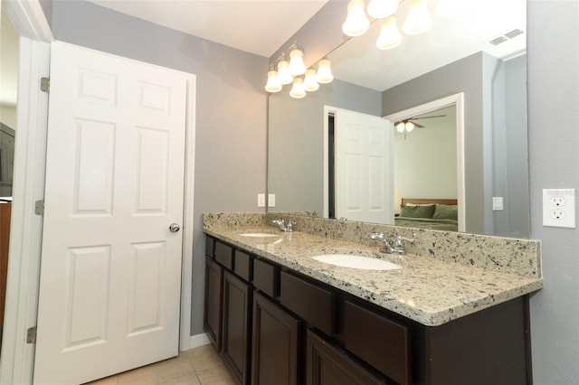 bathroom with vanity and tile patterned floors