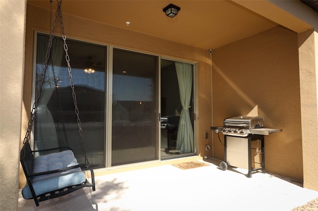 view of patio with a grill