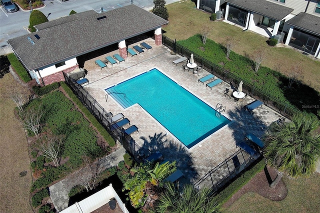 view of swimming pool with a patio