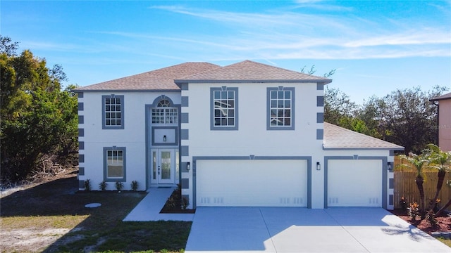 view of front of property with a garage