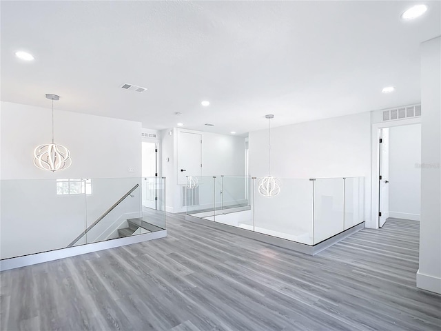 unfurnished room featuring dark hardwood / wood-style floors