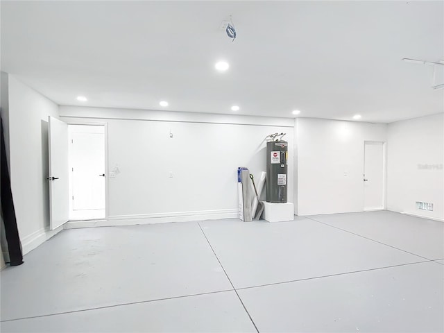 garage featuring electric water heater