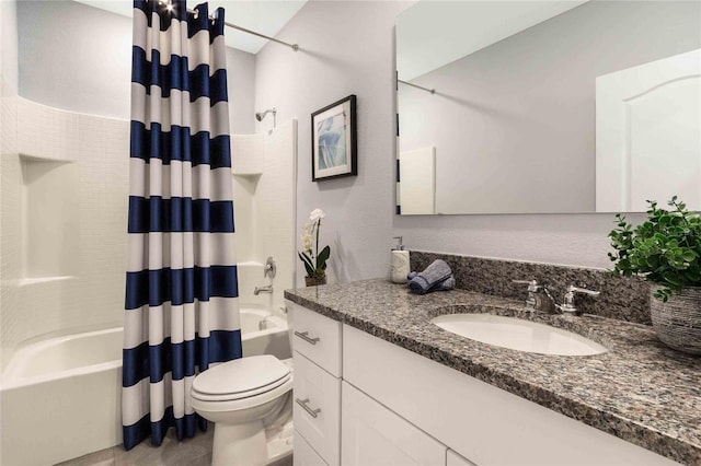 full bathroom featuring vanity, shower / bathtub combination with curtain, and toilet