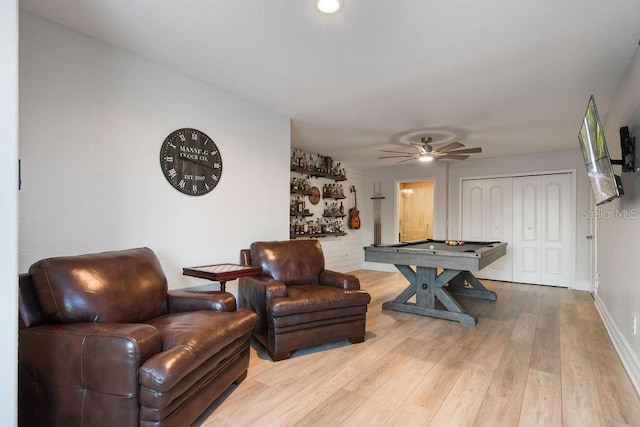 game room featuring ceiling fan, pool table, and light hardwood / wood-style floors