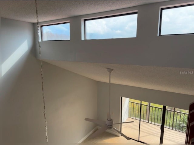 interior details featuring a textured ceiling