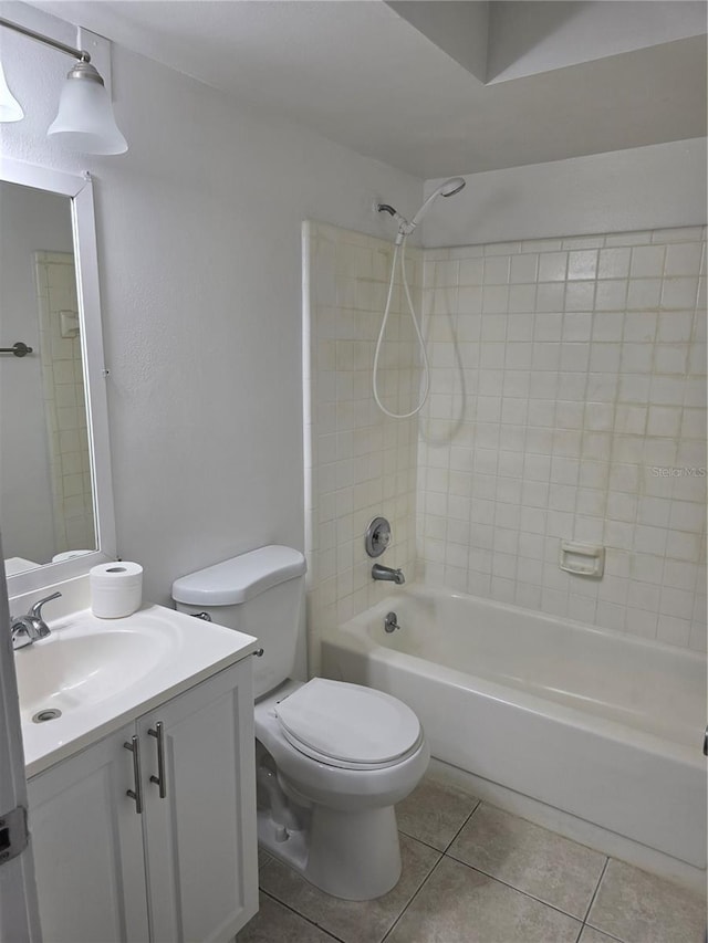 4826 Marks Ter Unit 389, Orlando, FL 32811 - bathroom with tile patterned floors, vanity, and washtub / shower combination