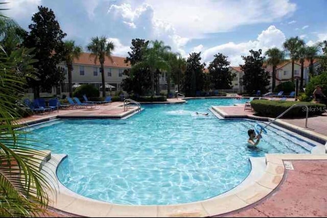 view of pool with a patio