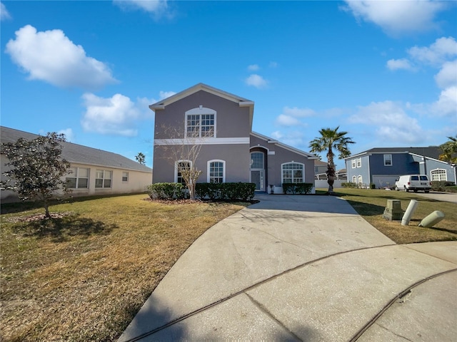 front facade with a front lawn