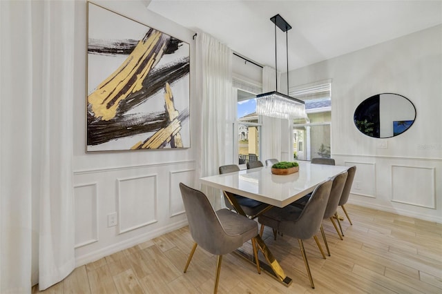 dining room with light wood-type flooring