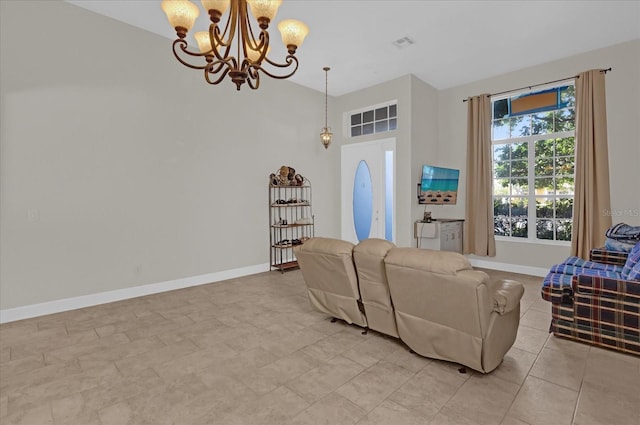 living room with an inviting chandelier