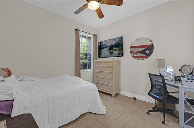 tiled bedroom with ceiling fan