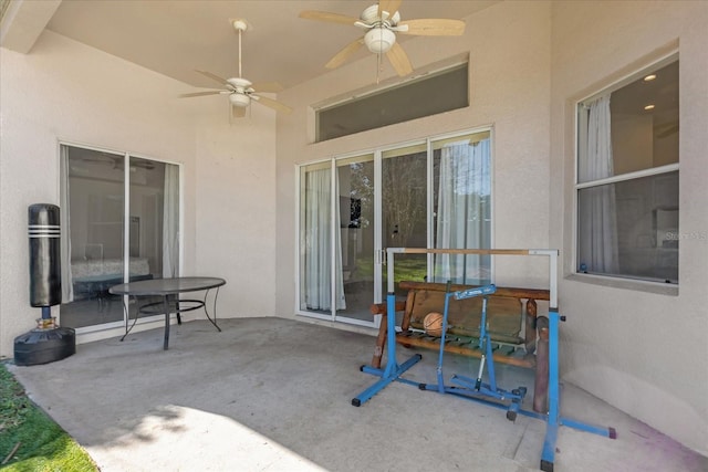 view of patio / terrace featuring ceiling fan