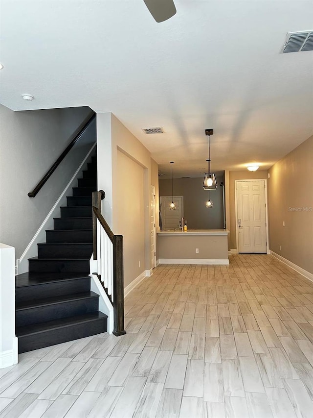 unfurnished living room featuring light hardwood / wood-style floors