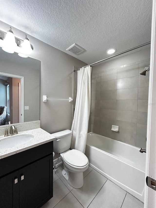 full bathroom with tile patterned flooring, vanity, toilet, and shower / bath combo