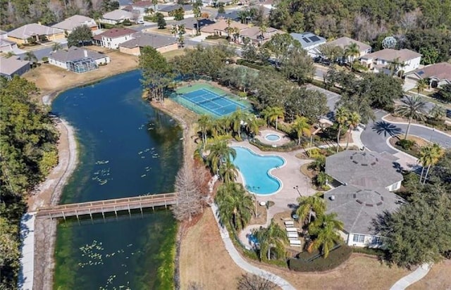 drone / aerial view with a water view