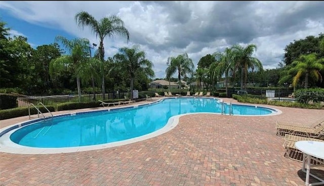 view of pool with a patio area