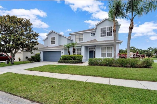 view of front property with a garage and a front lawn